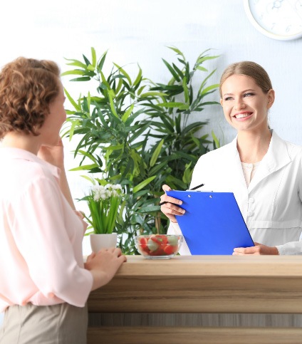 team member talking with patients